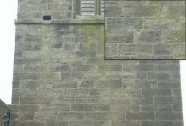 The bullet holes in the tower